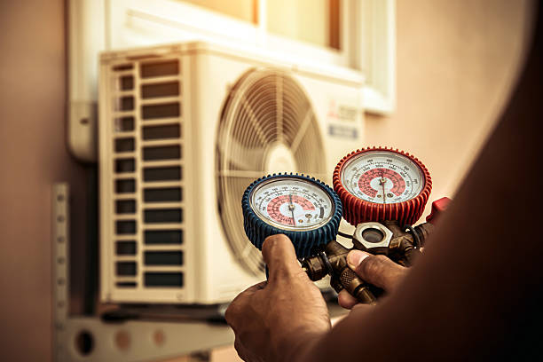 Professional Air Conditioning Service technician working in Jones, OK